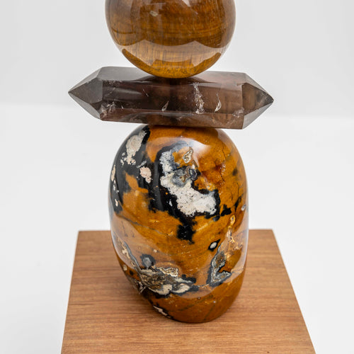 Ancient Sands II is entirely unique and made from the following precious crystal stones: From the top – 2 pieces of Yellow Jasper, Tigers Eye, Pietersite sphere, Yellow Jasper, Tigers Eye sphere, Smokey Quartz rod and a large form of Yellow Jasper.  