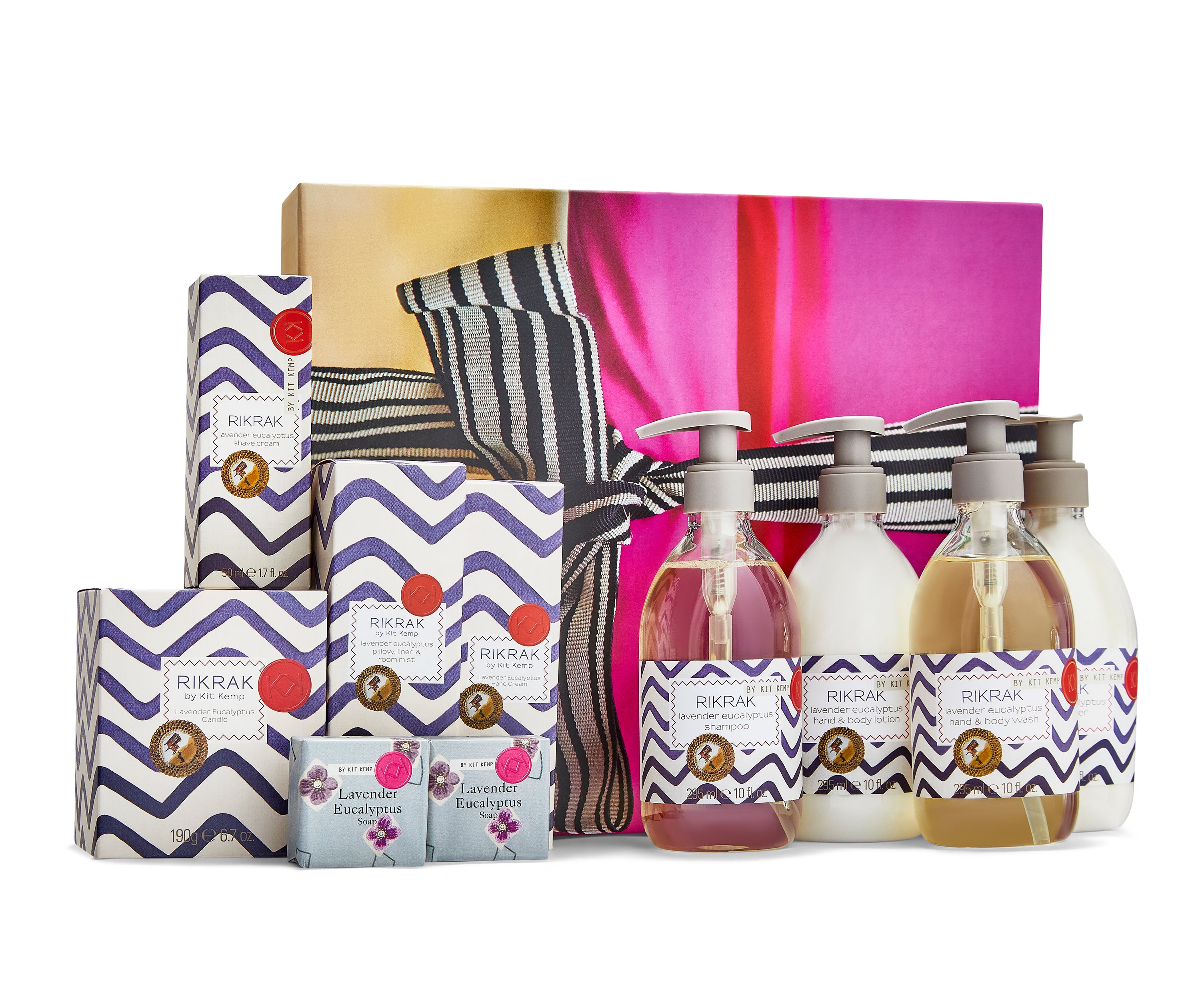 A beautifully decorated Kit Kemp Gift box, in pink, and gold, is printed with black and white bow, and includes the full range of Rik Rak body and bath range in lavender scent including:- Lavender Eucalyptus Shampoo, Conditioner, Hand and Body Wash, Hand and Body Lotion, Pillow and Room Mist, Candle, Hand Cream, Shave Cream, 2 x 50g Soaps