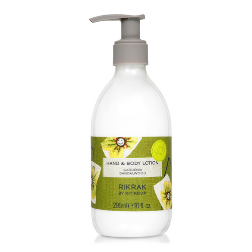 A 295ml plastic bottle of hand and body lotion with pump dispenser scented with Gardenia Sandalwood. Label has a green friendly flowers design applied.