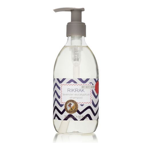 A 295ml plastic bottle of shampoo with pump dispenser scented with Lavender Eucalyptus. Label has a blue rick rack design applied.