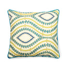 Luxurious embroidered cushion with a sophisticated geometric design. The undulating lines and diamond shapes of the pattern create a visually complex and refined look, finished with sharp, contrasting teal piping for a bespoke feel.