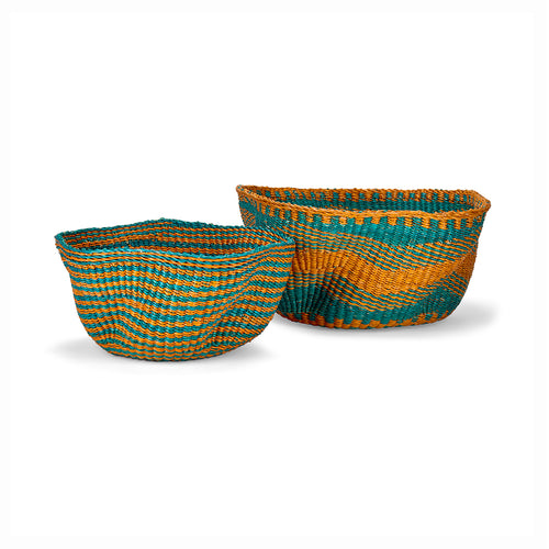 Hand made in Ghana, woven and colourful baskets by Shop Kit Kemp have a unique sculptural quality, and make a perfect vessel for home decor and storage