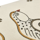 Close-up of the intricate hand-stitched birds, highlighting the fine needlework and tactile textures of the artisan embroidery.