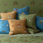 Kit Kemp's Weekend Collection cushions, each handcrafted with embroidery characters and botanical details.