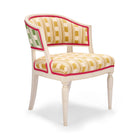 Whitby chair with white distressed timber frame, upholstered in iconic Christopher Farr fabric, Lost and Found, created by Kit Kemp.