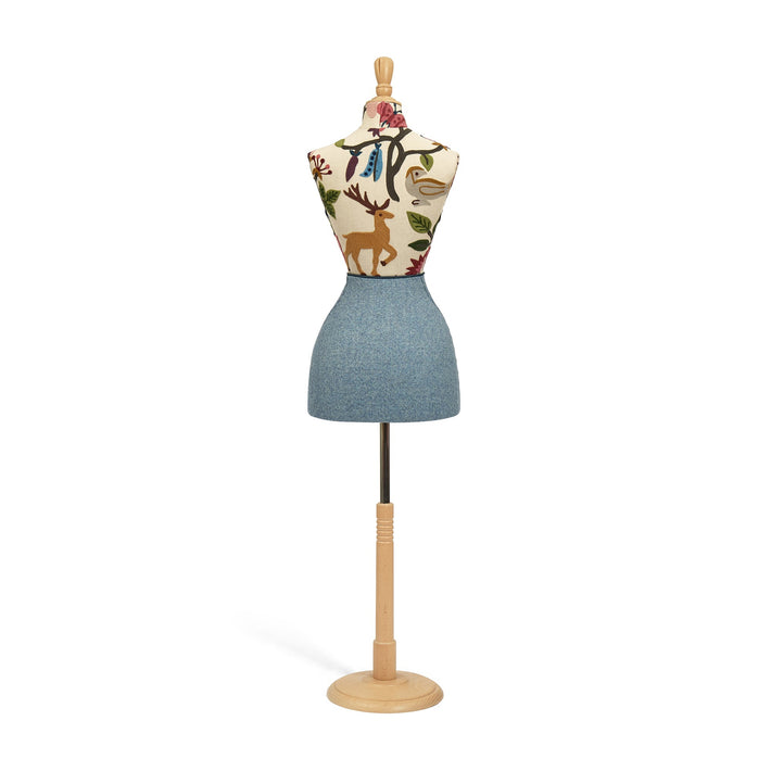 Mannequin torso with deer design on a white background