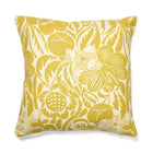 Yellow floral patterned pillow on a white background