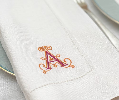 Close up of the linen napkin - A letter in pink