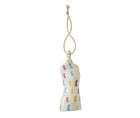 An angled view of the all over mannequin ornament which is decorated with small polka dot like mannequin silhouettes in turquoise, pinks and yellows, the all over mannequin ornament makes for a bright and unusual addition to you Christmas decorations. 