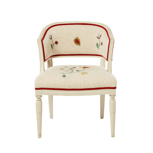 A chair with floral hand embroidery