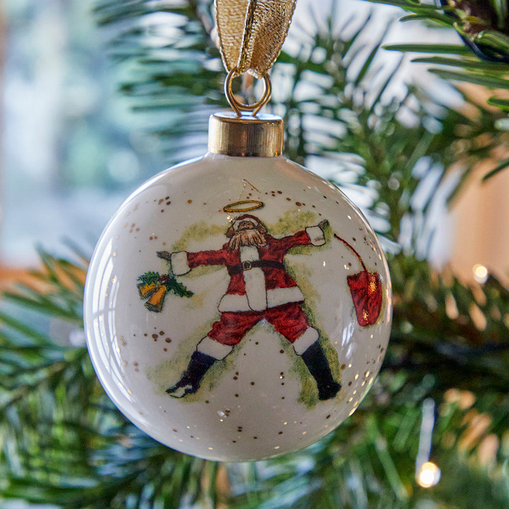 Best in Snow santa character bauble is part of Shop Kit Kemp's fine china festive decorations collection, created for Spode.