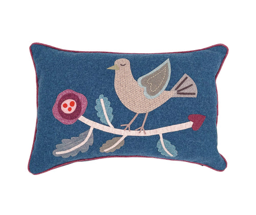 Our handmade Large Rectangular Blue Bird Cushion demonstrates the fabulous craft of hand applique and stitchwork, and is unique in nature. Made in the UK by the Kit Kemp Design Studio, this simplified Bird design takes its inspirations from folklore, utilising a collage of fabrics, on a blue wool cushion, with contrasting red wool piping, makes a delightfully quirky focal point to any room. Size 16 inches by 24 inches / 40cm by 60cm