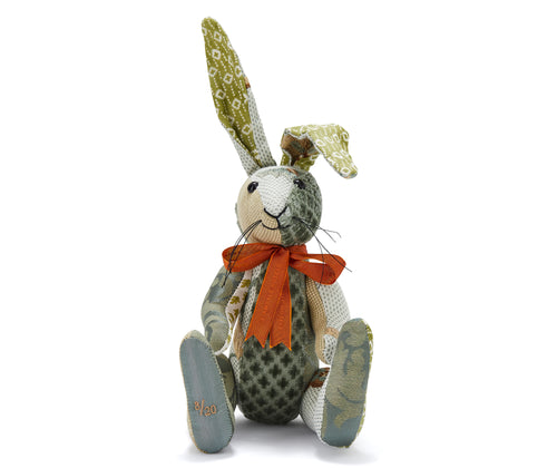 Limited edition Minnie Rabbit made using Chelsea Textiles embroidered fabric in green tones