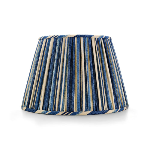 Striped lampshade with blue and beige pattern on a white background