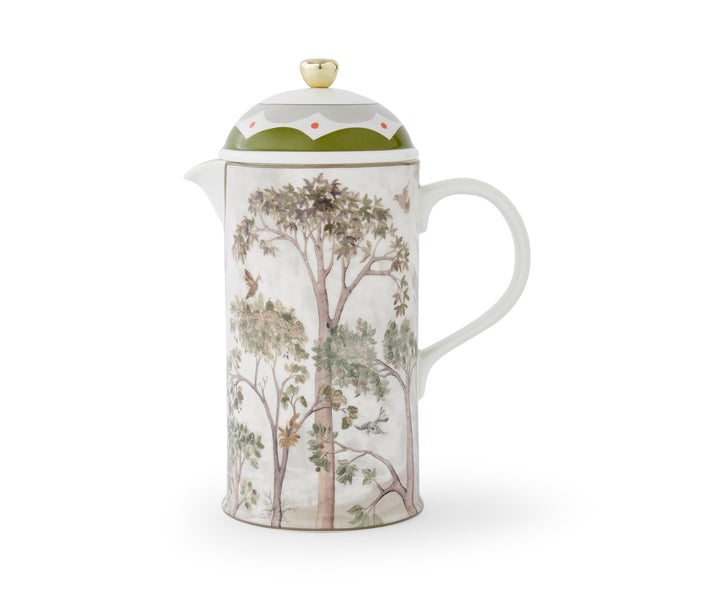 Front shot of cafetiere wrapped in Kit Kemp's tree top landscape, of billowing leaves and birds in flight, in soft beiges and greens