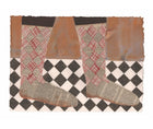 Artwork by Jo Waterhouse showing pair of diamond check and newspaper cut out socks on black and white checkered background