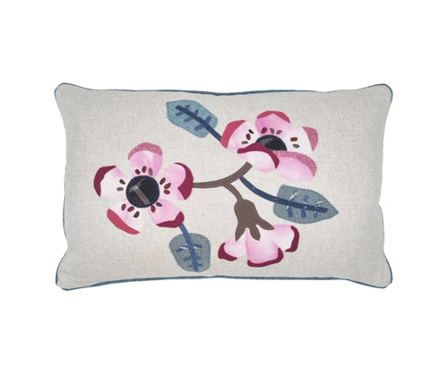 Rectangular shaped cushion with applique flowers in pink tones with plain backing and blue piping