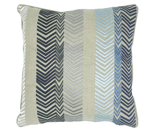 Kit's signature Bookend design in linen, to give this cushion a luxurious feel, whilst the geometric stripes, form a bookend chevron embroidery design which ranges from silver and steel greys, shades of blue, to create this stand out, double sided and eye catching cushion. Content : 100% linen, 100% viscose embroidery.