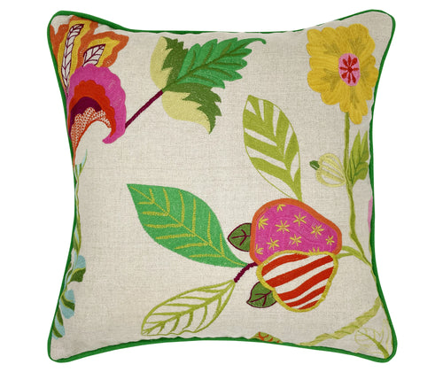 This image features a decorative cushion adorned with an intricate botanical embroidery design. The design includes various colorful embroidered elements such as flowers, leaves, and stylized motifs on a light fabric background. The edges of the pillow are accented with a green piping. The main colors visible in the embroidery include pink, red, yellow, green, and hints of orange, creating a vibrant and eye-catching appearance.