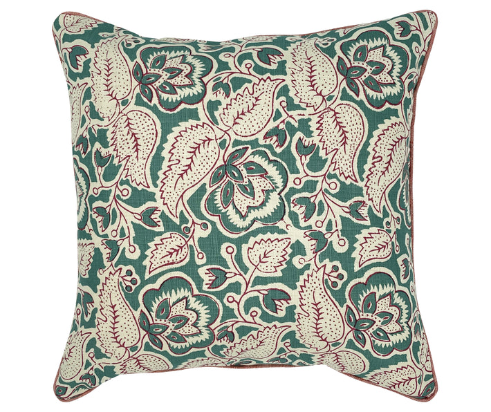 The image shows a decorative cushion with a detailed and intricate paisley style pattern. The pattern features a combination of floral and abstract elements in shades of green, cream, and red. The design and colors suggest a traditional or ethnic style.