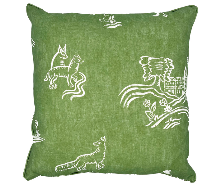 The front of the Friendly Folks outdoor cushion. Inspired by 15th and 16th century tapestries, this cushion shows bushy tailed creatures peering amongst hedgerows, blooming trees and rolling English hills. With a rich sense of folklore and the lyricism of rural land, Friendly Folk is made contemporary in basil green.