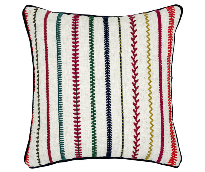 The Sintra embroidered cushion,is striped design, is reminiscent of embroidery samplers with every line showing a different embroidery stitch in deep reds, orange, green and ochre on an ecru background, and piped in navy wool. Material : 100% linen Size: 45 x 45cm