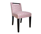 Side view - Handle Chair, upholstered in Kit Kemp for Christopher Farr 'Small Way' in Hot Pink, with contrast fuchsia piping; legs in 'Wenge' timber finish, with chrome studding at the top of the leg