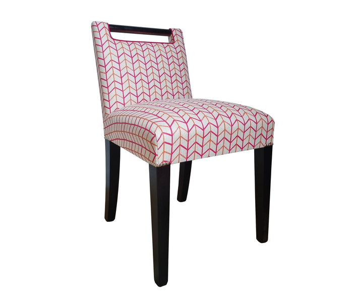 Side view - Handle Chair, upholstered in Kit Kemp for Christopher Farr 'Small Way' in Hot Pink, with contrast fuchsia piping; legs in 'Wenge' timber finish, with chrome studding at the top of the leg