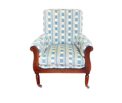 Kit Kemp Jessica Chair is her modern take on a library chair, with classic wood and stud detailing, this extremely comfortable chair invites you to to take a seat with a great book. Upholstered in Kit's Lost and Found fabric, in light denim, and ecru chequerboard pattern, with railroad stripe tipping by Christopher Farr, gives this chair a modern aspect , which brings your room to life, by joining the traditional with the contemporary. 