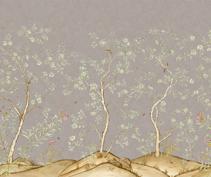 Kit's New Songbird Wallpaper, in collaboration with Andrew Martin, takes the stylised nature of Chinoiseries landscapes to a softer and more relaxed realm with an English twist. The Dawn colourway is suffused in the the pink grey light of dawn where a breeze ruffles the leaves of loosely painted trees dotted with dog roses. From the delicate branches, songbirds call to each other across this serene panorama.