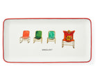 The rectangular platter is ideal for a fun and informal tea party, and feature 4 spaced out loungers, with one male character lounging in the right hand chair, dressed in red and yellow, embracing the joy of relaxation, trimmed in a red.