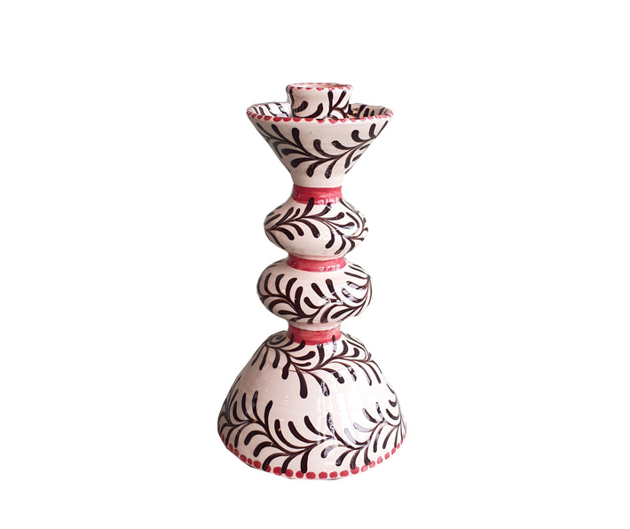 The Garland candlestick, by Katrin Moye, with it's brown circling garlands and contrasting flamingo pink bands, is a beautiful addition to any mantle piece or table setting, either one it's own or paired with itís slightly more diminutive partner. Size: H: 17.5cm Diameter: Base: 10cm