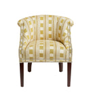 Min tub chair in yellow lost and found fabric, front view.