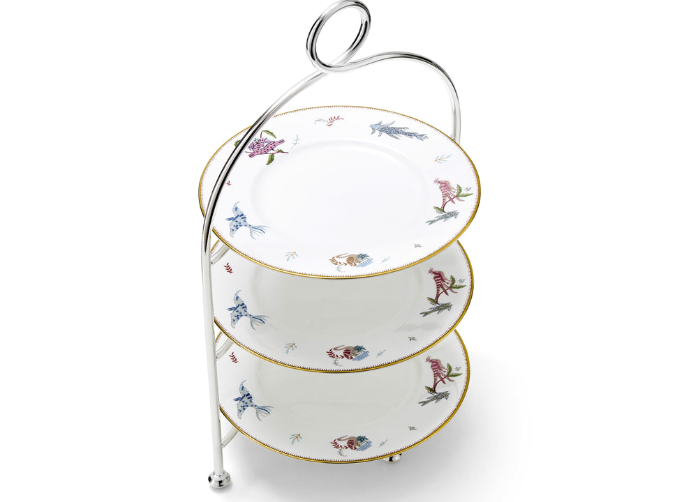 The Afternoon Tea stand is shown here dressed with the 3 afternoon tea plates, from the sailors farewell collection, featuring small illustrations of the lady waving loved ones goodbye, in the centre, and the sea creatures encountered along the way featured along the edge of this pale blue plate.