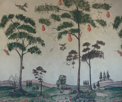 Mythical Land Wallpaper in vellum , has a pale green background, against which giant mythical pear trees line the landscape, in which forest like creatures can be found sketched in tones of blues, greens , alongside a lively river bed of soft pinks, and orange tones, against the green and fertile banks bordered with wild flowers.