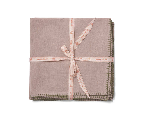 Beautifully soft Italian linen 50x50 napkins, natural beige linen hand-stitched in olive green blanket-stitching around the edges, sold in packs of 6. Shown tied with kit kemp ecru, and orange ribbon.