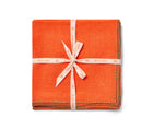 Beautifully soft Italian linen 50x50 napkins, deep orange linen hand-stitched in olive green blanket-stitching around the edges, sold in packs of 6. Shown tied with Kit Kemp ecru, and orange ribbon.