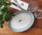 Picture of plate, glasses and jug on a table