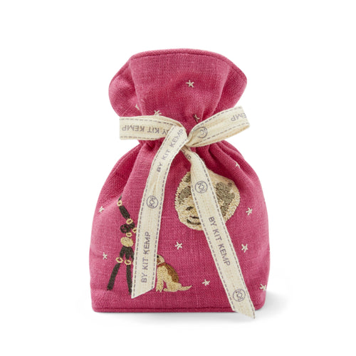 Our Moon dog lavender bag, features a hand embroidered dog, looking through a telescope at the moon and starred dotted in a bright pink sky, and is tied with a natural Kit Kemp ribbon, and lined matching pink linen, and filled with lavender, (photographed face on).