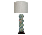 Front view of papillon lamp showing delightful silvery willow trees dance with blooming powder pink roses and burnt orange butterflies against chalky teal skies. 