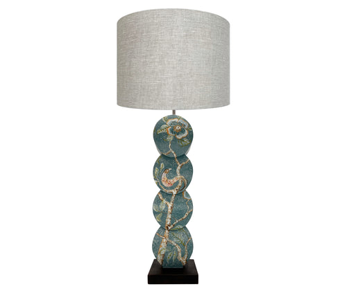 Front view of papillon lamp showing delightful silvery willow trees dance with blooming powder pink roses and burnt orange butterflies against chalky teal skies with small bird