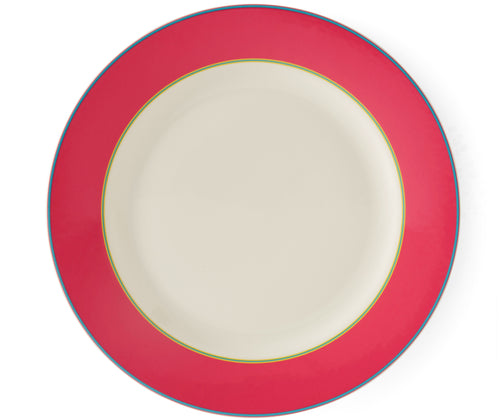 The Pink Calypso Charger plate, is a large 33cm white plate, with a wide pink band, bordered by narrow central stripes in green and yellow, and tipped with a blue outer band. Sold in sets of 4, these plates bring joy and sunshine to your table settings.