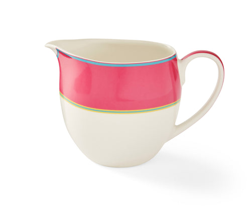 The Pink Cream Jug has a elegant curvaceous shape and is topped with a wide pink band, bordered by narrow stripes in blue and yellow, and adds a touch of colour to your breakfast table.