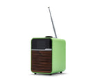 The R1s Smart Radio collaboration with Ruark Audio , has resulted in an exclusive bright bright green radio, with walnut grille, with silver metal detailing, and black display, shown from side to show green polymer casing, and a aerial up. Dimensions: H175 ◊ W130 ◊ D135mm