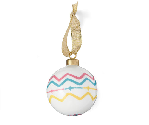 Kit Kemp's recognizable Zig Zag stripes from the iconic rick rack fabric design has been re-interpreted on this simple white china bauble, in pink, turquoise and yellow and makes a welcome edition to any tree 