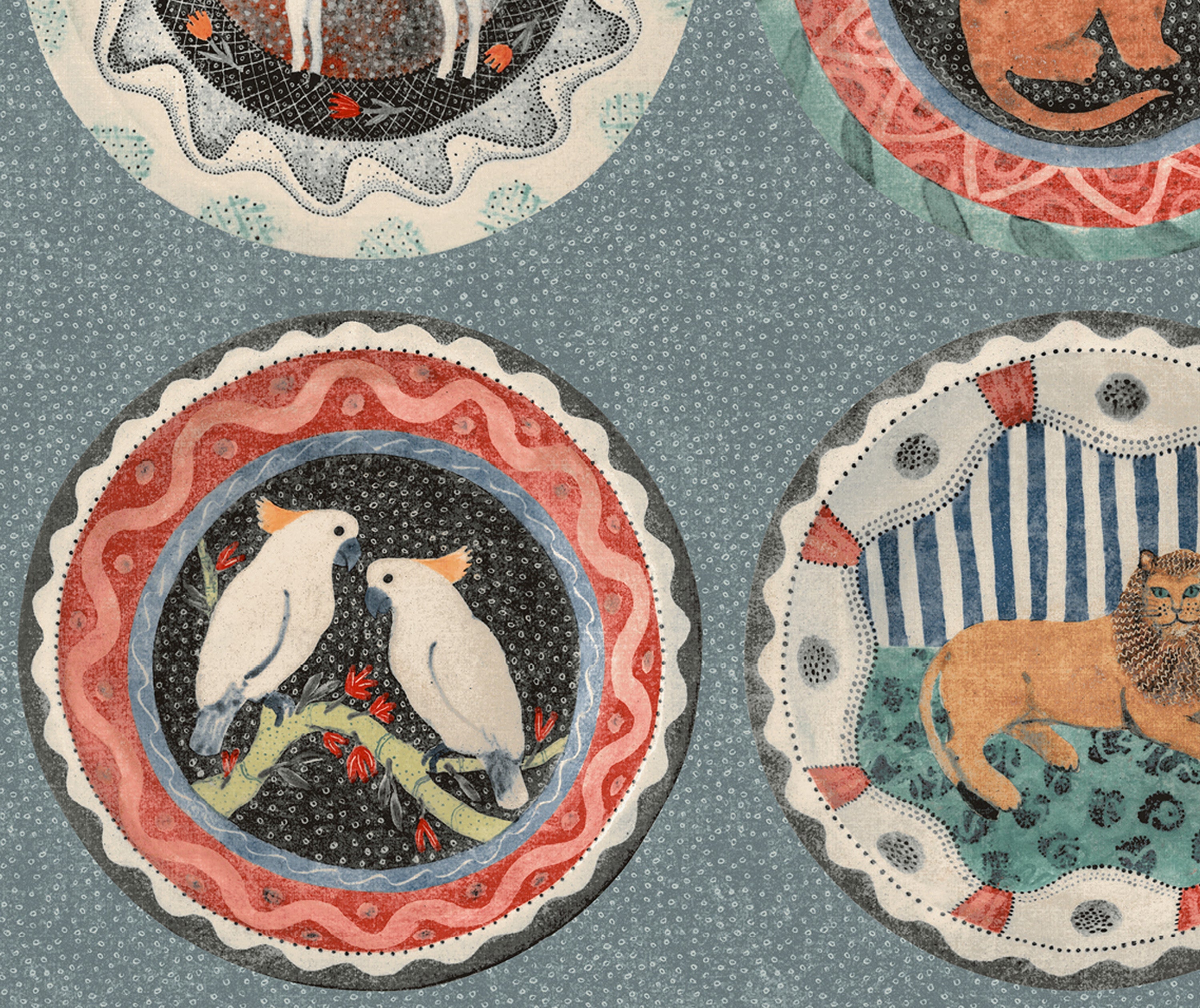  A close up of the teal Robina's Dinner Party wall paper with it teal background is peppered with lighter shaded dots, and brightly coloured plate design, with its decorative plates featuring whimsical animals, with this shot particularly focused on a pair of cockatoos a depth of colour with its brightly bordered animal design stands out from. 