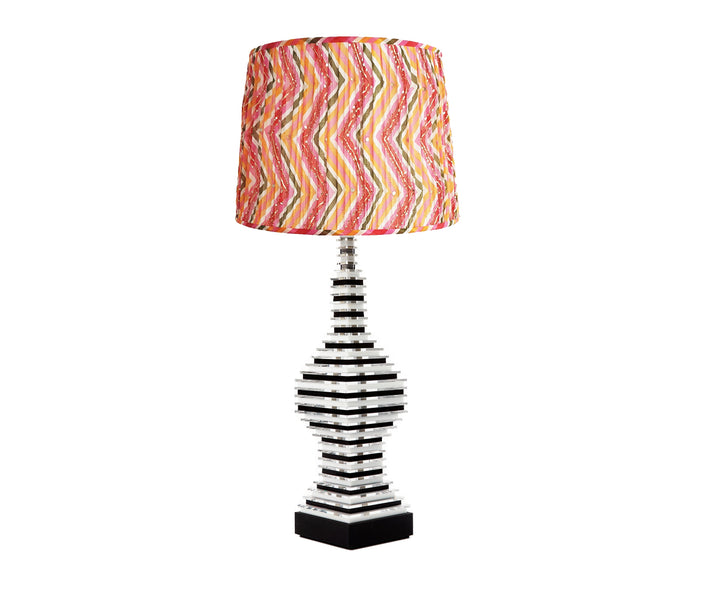 Black and white rocket lamp with fun pink shade