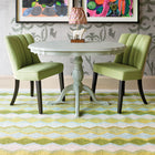 Geometric design and green tones rug by Kit Kemp to create landscape and light play, and bring greenery and joy to any interior.