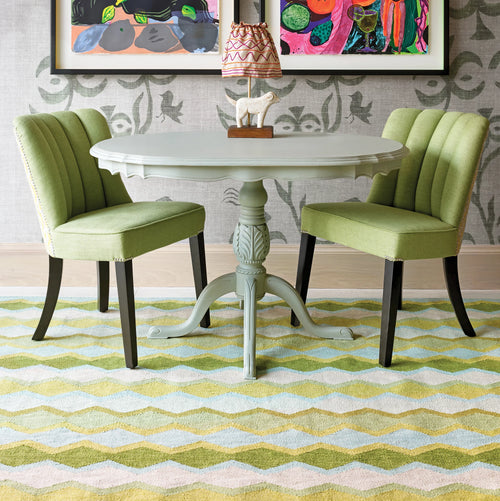 Geometric design and green tones rug by Kit Kemp to create landscape and light play, and bring greenery and joy to any interior.
