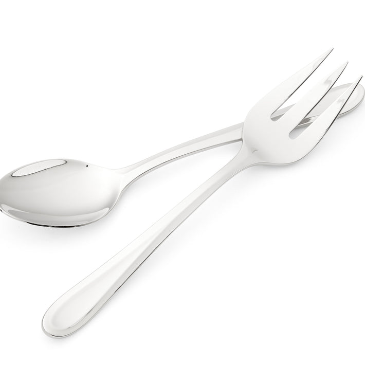 This 2 piece Server set, designed by Kit Kemp for Spode, is inspired by a classic English Cutlery with it's embossed scoop handle, are forged in 18/10 stainless steel, and are the perfect for any well dressed serve-ware, made up of large spoon and 3 pronged curved serving fork.